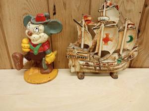 lot 182 image: Antique Cast Iron Mickey Mouse Ledenhosen German Shorts , and Hubley Spanish Galleon 1930s Ship Door Stops