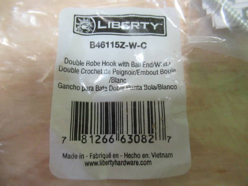 lot 210 image: (10 Pack) Liberty Hardware B46115Z-W-C Double Robe Hook With Bali End in White.