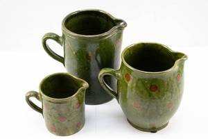 lot 119 image: 3 Thrown Ceramic Pottery Pitchers w Green Glaze & Brown Polka Dots