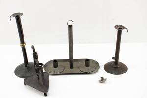 lot 120 image: Group of Antique and Modern Metal Taper Candle Holders