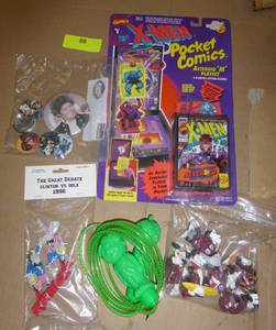lot 88 image: Vintage toys - green giant jump rope, the Monkees pins, California Raisins, X-Men play set
