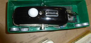 lot 89 image: Vintage small portable sewing machine, Tin music box with vintage fan and glasses
