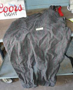 lot 134 image: Mens Woolrich wool bibs, torn at seam and not hemmed, guessing 2xl