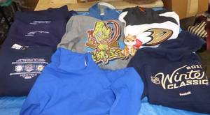 lot 136 image: Group of 9 kids New sweatshirts and a tiger