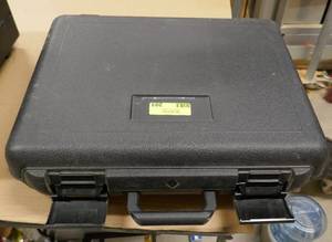 lot 203 image: Plastic locking padded case for handguns or electronics