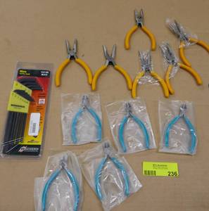 lot 236 image: 5 Needle nose pliers, 5 small snips and a set of hex wrenches