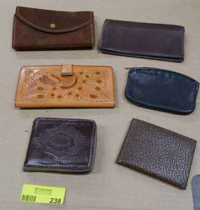 lot 238 image: 12 Leather Wallets and 2 purses