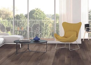 lot 108 image: Roughly 180 Sq Ft (10 Boxes) of Mohawk Harmonics Battleship Oak Laminate Flooring w Attached Underlayment
