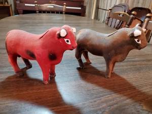 lot 101 image: Two Vintage Bull Piggy Banks