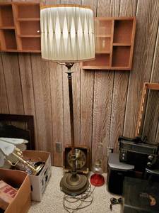 lot 115 image: Clock, Oil Lamp, And Floor Lamp