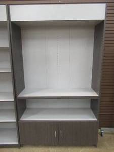 lot 17 image: Wall Display Shelving UnitBookcase in Dark Gray and White. Approximate Dimensions 47 x 16 x 80 Tall. - Includes 1 Adjustable Shelf and Bottom Storage Cabinet.