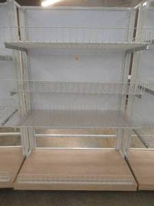 lot 75 image: Stationary Wall Display Rack With Adjustable Wire Basket Shelves And Wood Base. Approximate Dimensions 51 x 26 x 78 Tall.