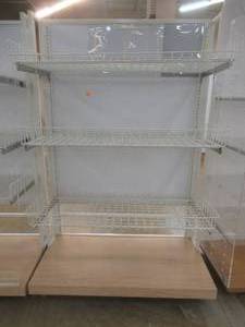 lot 76 image: Stationary Wall Display Rack With Adjustable Wire Basket Shelves And Wood Base. Approximate Dimensions 51 x 26 x 78 Tall.