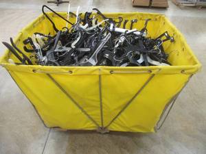 lot 81 image: Hamper Filled With Miscellaneous Plastic Hangers. Must take all.