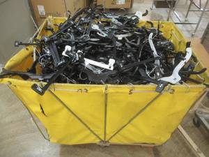 lot 82 image: Hamper Filled With Miscellaneous Plastic Hangers. Must take all.