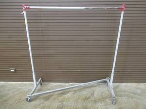 lot 85 image: Steel Apparel Rack on Casters, Approximate Dimensions 62 x 24 x 65 Tall.