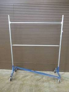 lot 86 image: 2-Tier Steel Apparel Rack, Approximate Dimensions 63 x 24 x 79 Tall.