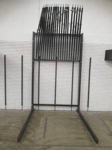 lot 91 image: Custom Built Displays of Dalton Large 20 Swing Arm Steel Carpeting Display Rack, 66 x 70 x 105 (Arms 72 x 1 x 33 Tall).