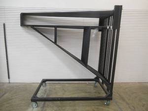 lot 92 image: Large Rolling 10 Swing Arm Steel Carpeting Display Rack, 46 x 72 x 88 (Arms 100 x 1 x 66 Tall).
