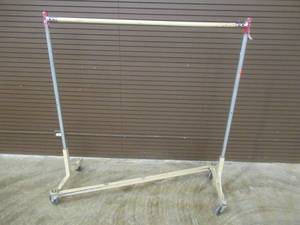 lot 84 image: Steel Apparel Rack on Casters, Approximate Dimensions 62 x 24 x 65 Tall.