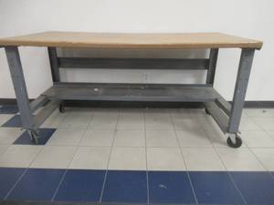 lot 137 image: Large Rolling WorkDisplay Table. Approximate Dimensions 72 x 36 x 36 Tall.