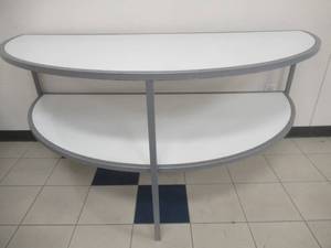 lot 141 image: 2-Tier Half Circle Display Table (Buy 2 for Whole Circle), Approximate Dimensions 72 x 36 x 34 Tall. Slight Scratch and Dent.