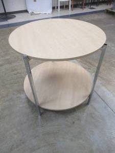 lot 143 image: Display Table With Bottom Shelf. Approximate Dimensions 36 DIa. x 33 Tall. Slight Scratch and Dent.