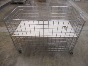 lot 158 image: Rolling Wire Display Bin With Shelf. Approximate Dimensions 50 x 26 x 34 Tall.