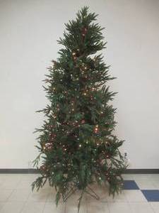 lot 187 image: 9 12 Ft Christmas Tree. A couple Strands of Lights are Out (Fuse)