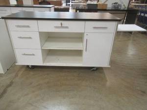 lot 224 image: Rolling RegisterService Cabinet With Fold Out Shelf. Plenty of Storage, Approximate Dimensions 73 x 29 12 x 42. In nice condition. Includes Key.