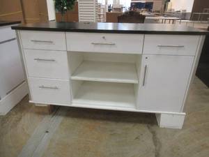 lot 225 image: Stationary RegisterService Cabinet With Fold Out Shelf. Plenty of Storage, Approximate Dimensions 73 x 29 12 x 42. In nice condition. Includes Key.