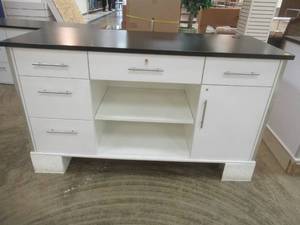 lot 226 image: Stationary RegisterService Cabinet With Fold Out Shelf. Plenty of Storage, Approximate Dimensions 73 x 29 12 x 42. In nice condition. Includes Key.