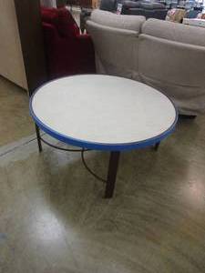 lot 526 image: 42 in Round Coffee Patio Table (NICE CONDITION, BLUE TAPE TO PREVENT DAMAGE TO EDGES)