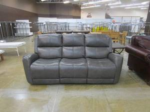 lot 534 image: 79 in Reclining Leather Sofa in Gray (MISSING PLUG ADAPTER)
