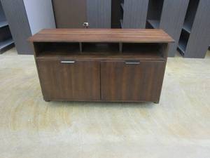 lot 541 image: 54 in Riverside TV Stand in Brown (SMALL CHIP ON CORNER)