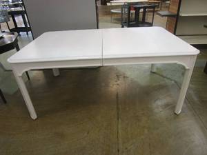 lot 555 image: 72 in White Wooden Table (TABLE ALSO HAS 40 IN LEAF, COUPLE SCUFFS & SCRATCHES ON THE TOP)