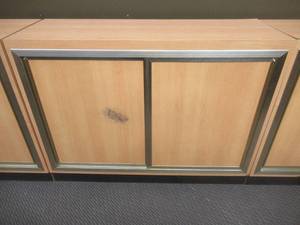 lot 275 image: Sliding Door Cabinet With Adjustable Shelf, Approximate Dimensions 48 x 17 x 36 Tall. Slight Scratch and Dent.