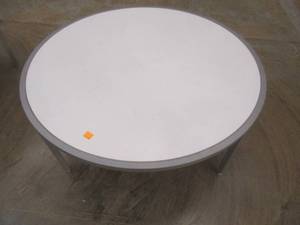 lot 282 image: Round Display Table, White Top, Approximate Dimensions 44 Dia x 15 12 Tall. Slight Scratch and Dent. In nice condition.