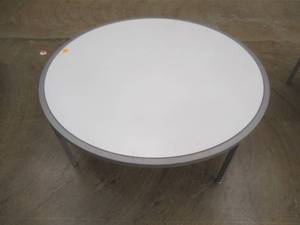 lot 283 image: Round Display Table, White Top, Approximate Dimensions 44 Dia x 15 12 Tall. Slight Scratch and Dent. In nice condition.