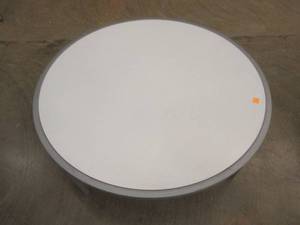 lot 284 image: Round Display Table, White Top, Approximate Dimensions 44 Dia x 15 12 Tall. Slight Scratch and Dent. In nice condition.