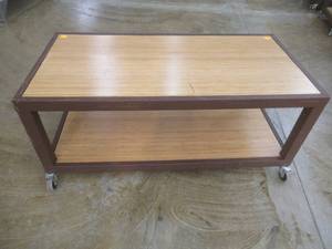 lot 286 image: Rolling Wooden 2-Tier Table With Steel Frame, Approximate Dimensions 48 x 24 x 21 Tall. Slight Scratch and Dent.