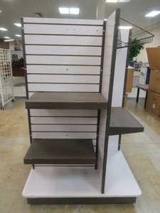 lot 346 image: Four-Sided Rolling Display Tower With Slat Walls And Adjustable Shelving, Approximate Dimensions 40 x 40 x 60 Tall.
