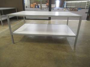 lot 308 image: 2-Tier Display Table With Steel Frame, Approximate Dimensions 48 x 30 x 23 Tall. Slight Scratch and Dent.