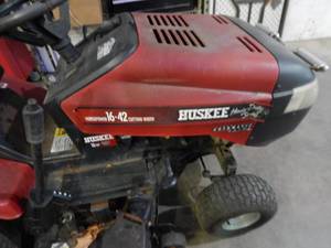 lot 1 image: Huskee 16 Hp. 42 Deck Riding Mower. Starts With A Jump. Needs Battery.