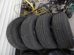 lot 3 image: Set Of Hankook Dyna Pro HT Tires With 75-90% Tread On Chevy 8 Bolt Aluminum Wheels With Center Caps