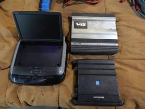lot 9 image: 2-Alpine Amps, 1-Alpine Flip Down DVD Player