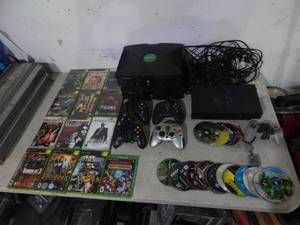 lot 53 image: 2-X Box Consoles & 2-Play Station 2 With Games, Controllers & Cords