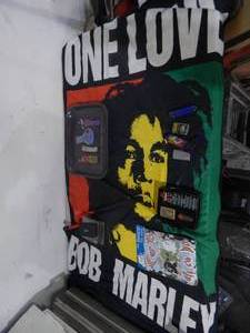 lot 59 image: Bob Marley Flag & Assorted Smoking Related