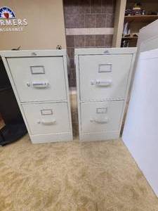 two 2 drawer file cabinerts