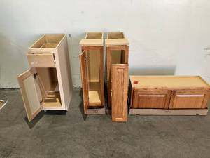 Lot of oak cabinets. DAMAGED